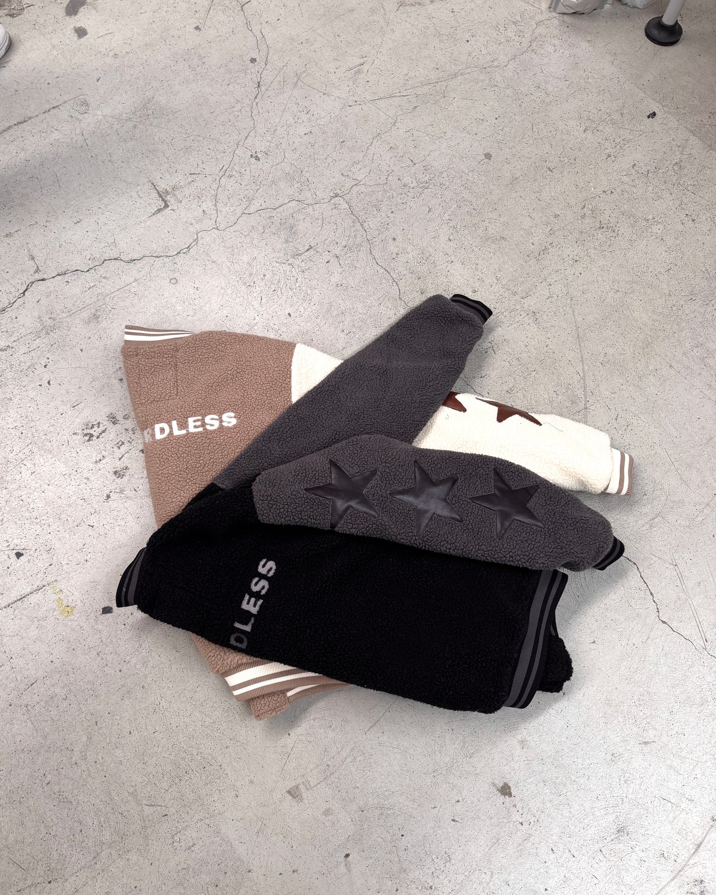 WORDLESS ICONIC TEDDY VARSITY JACKET