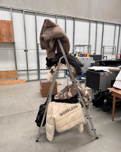 WORDLESS ICONIC TEDDY VARSITY JACKET