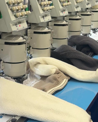 WORDLESS ICONIC TEDDY VARSITY JACKET